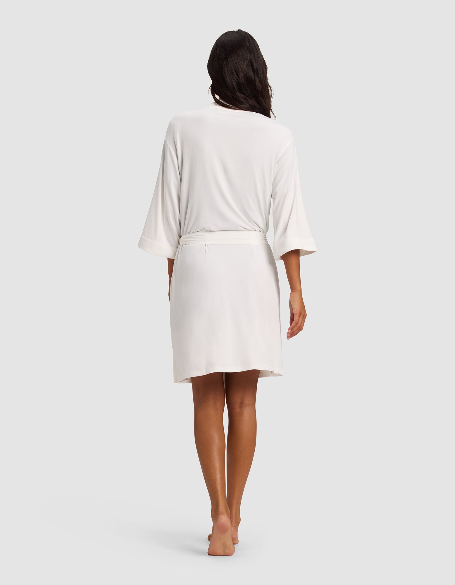 Ivory@woman wearing a Ivory cozy earth robe