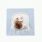 Beau@Overhead baby in a highchair sitting on the Beau Mini Mat