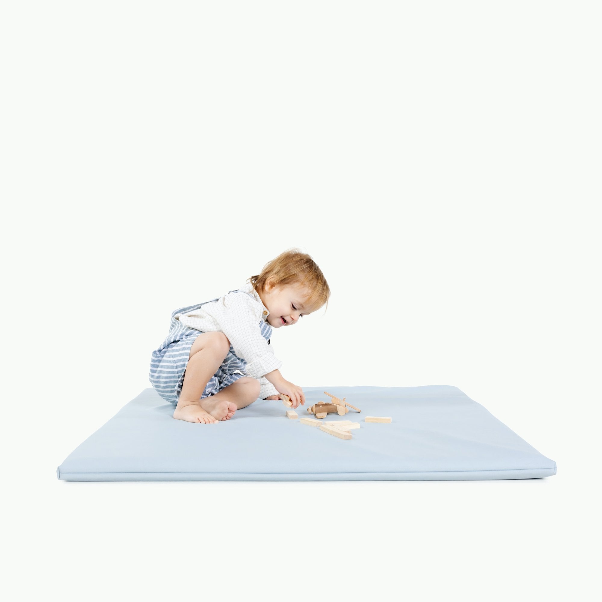 Beau (on sale)/ Square@Boy playing on Beau Padded Mini Square