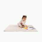 Belle@Little girl sitting on the Belle Mini Mat 