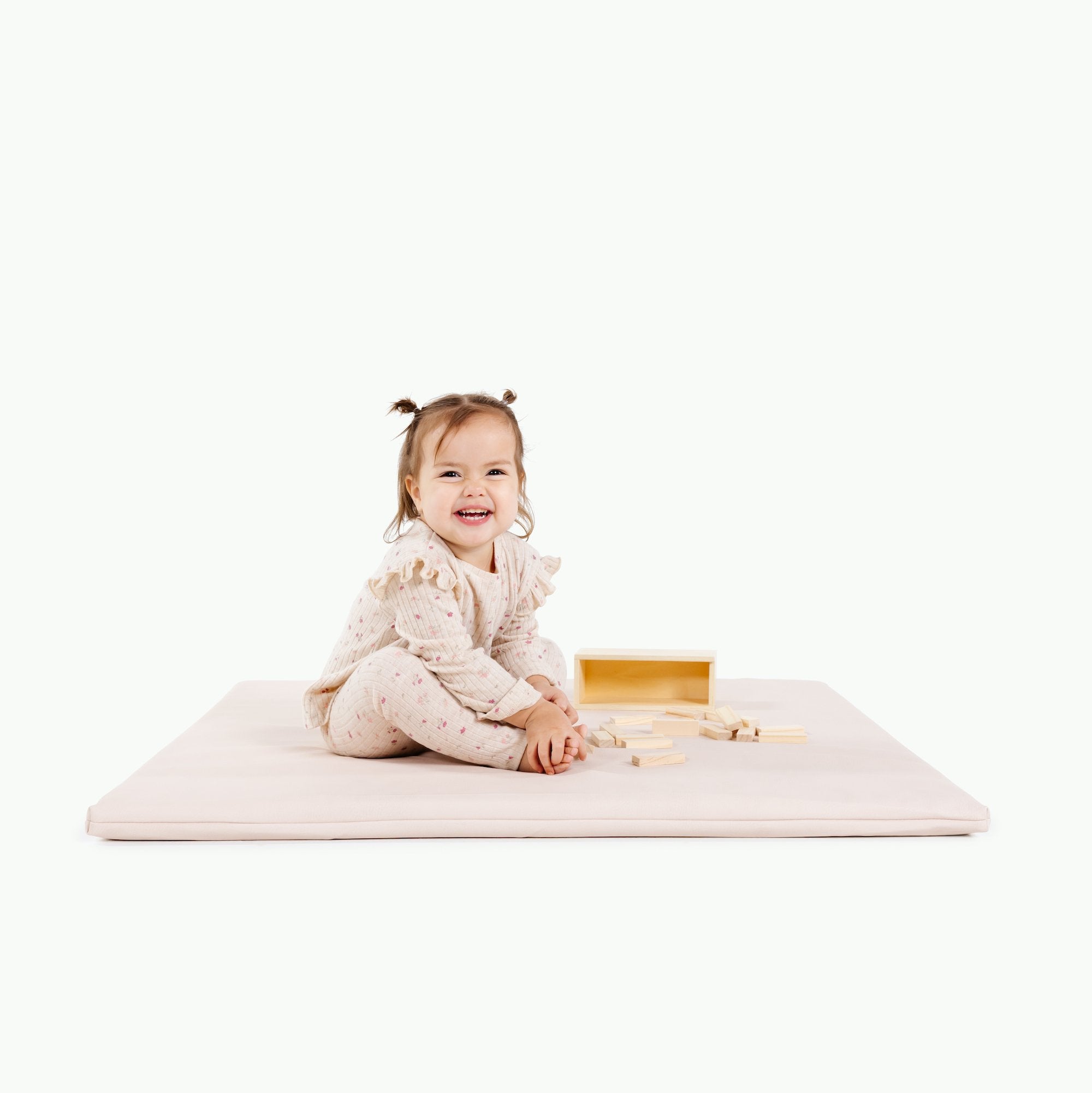 Belle (on sale)/ Square@Girl sitting on Belle Padded Mini Square