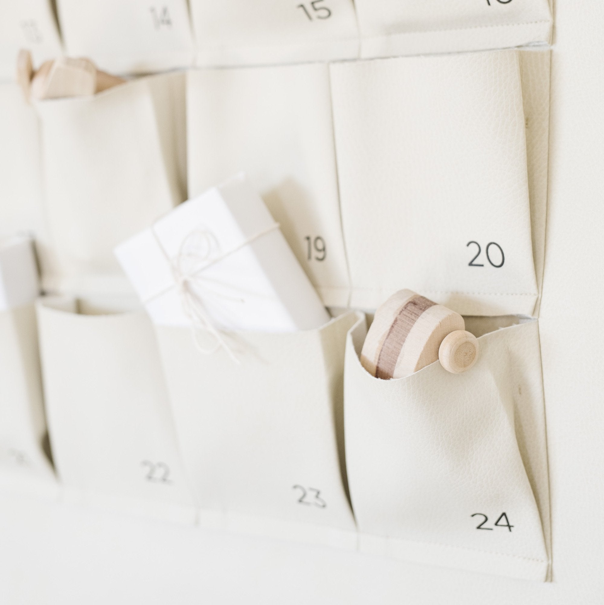 Ivory (on sale)@detail of small ivory advent calendar pockets