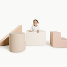 Tulle • Untanned • Millet • Ivory@kid playing on the tulle block playset