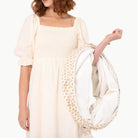 Bloom (on sale)@Woman holding bloom tunnel
