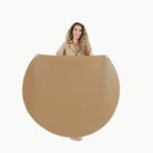 Camel / Circle@Woman holding the Camel Circle Midi Mat