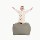 Fern (on sale)@Kid sitting on the Fern Square Pouf