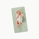 Flora (on sale)@baby lying on a micro changing mat
