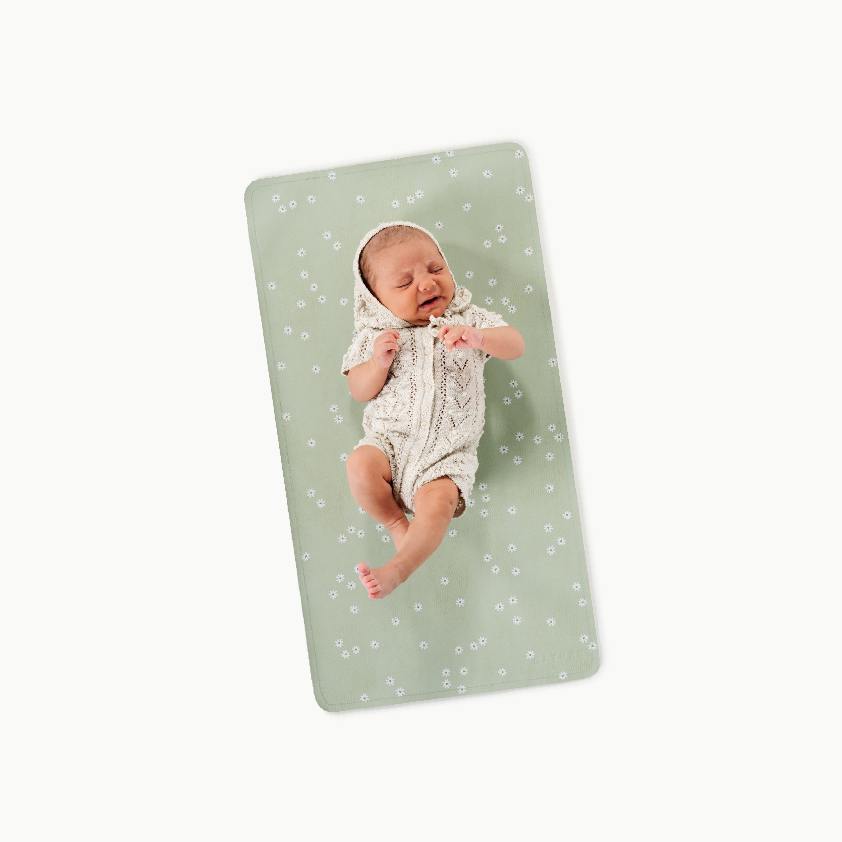 Flora (on sale)@baby lying on a micro changing mat