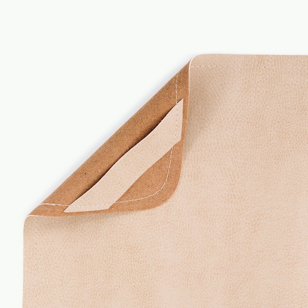 Untanned (on sale)@Hanging tab detail on the Untanned Micro+ Mat