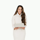 Pencil Stripe (on sale)@Woman holding the folded Pencil Stripe Midi+ Mat