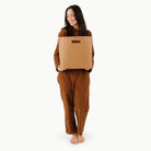 Camel (on sale)@woman holding medium storage bin