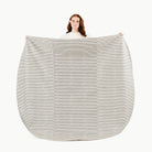 Stone Stripe / Circle@Woman holding the Stone Stripe Maxi Mat
