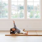 @Child rolling and playing on a comfortable tumbling mat