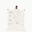 Uptown@Woman holding the Uptown Midi+ Mat