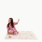Boulevard@child sitting on the Boulevard Mini+ Mat