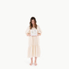 Commons / Circle@Woman holding packaged Common Midi Circle Mat