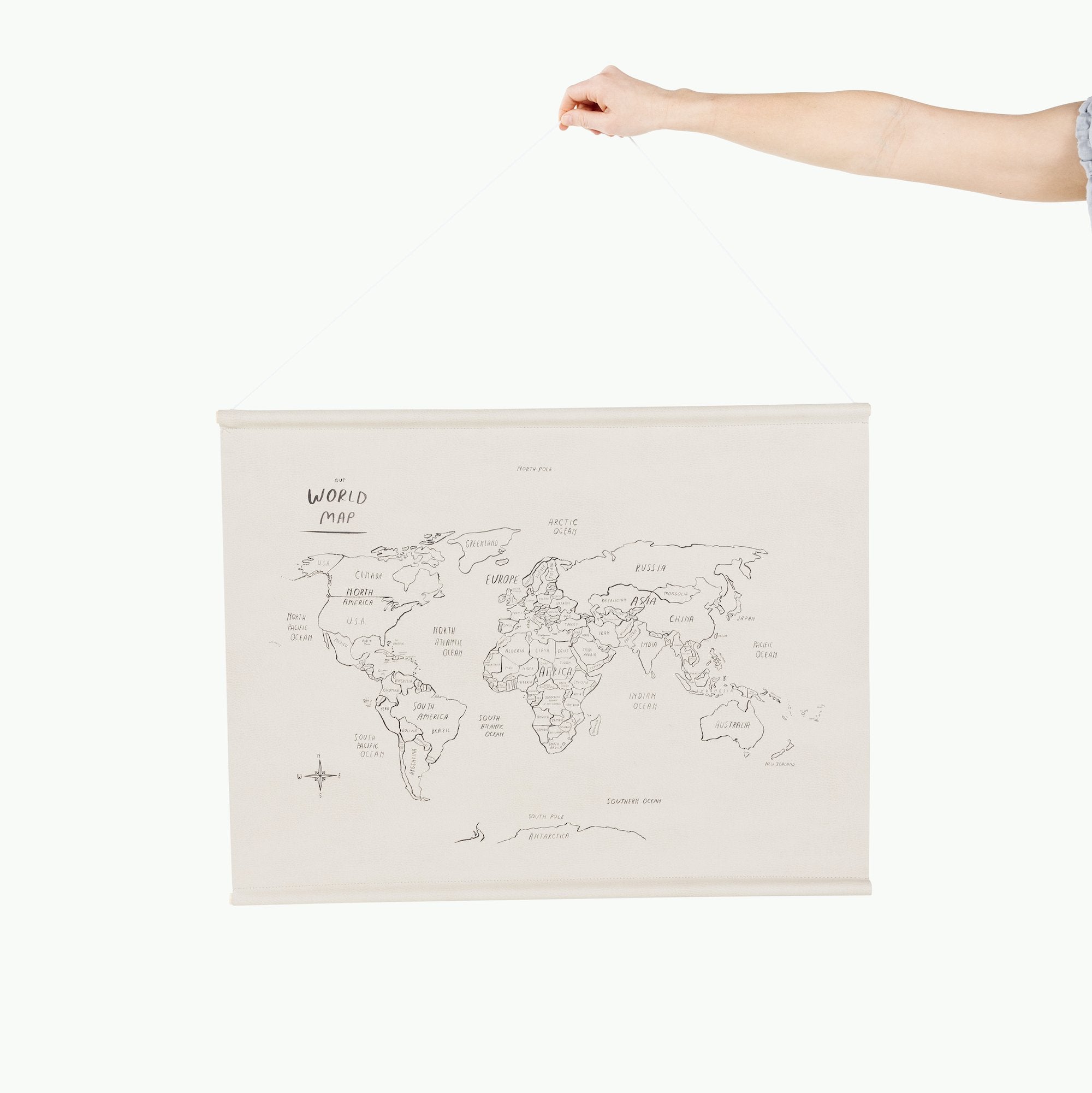 World Map@Up close photo of woman holding the World Map Poster