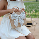 Untanned (on sale)@Little girl outside looking inside the Untanned Children's Purse
