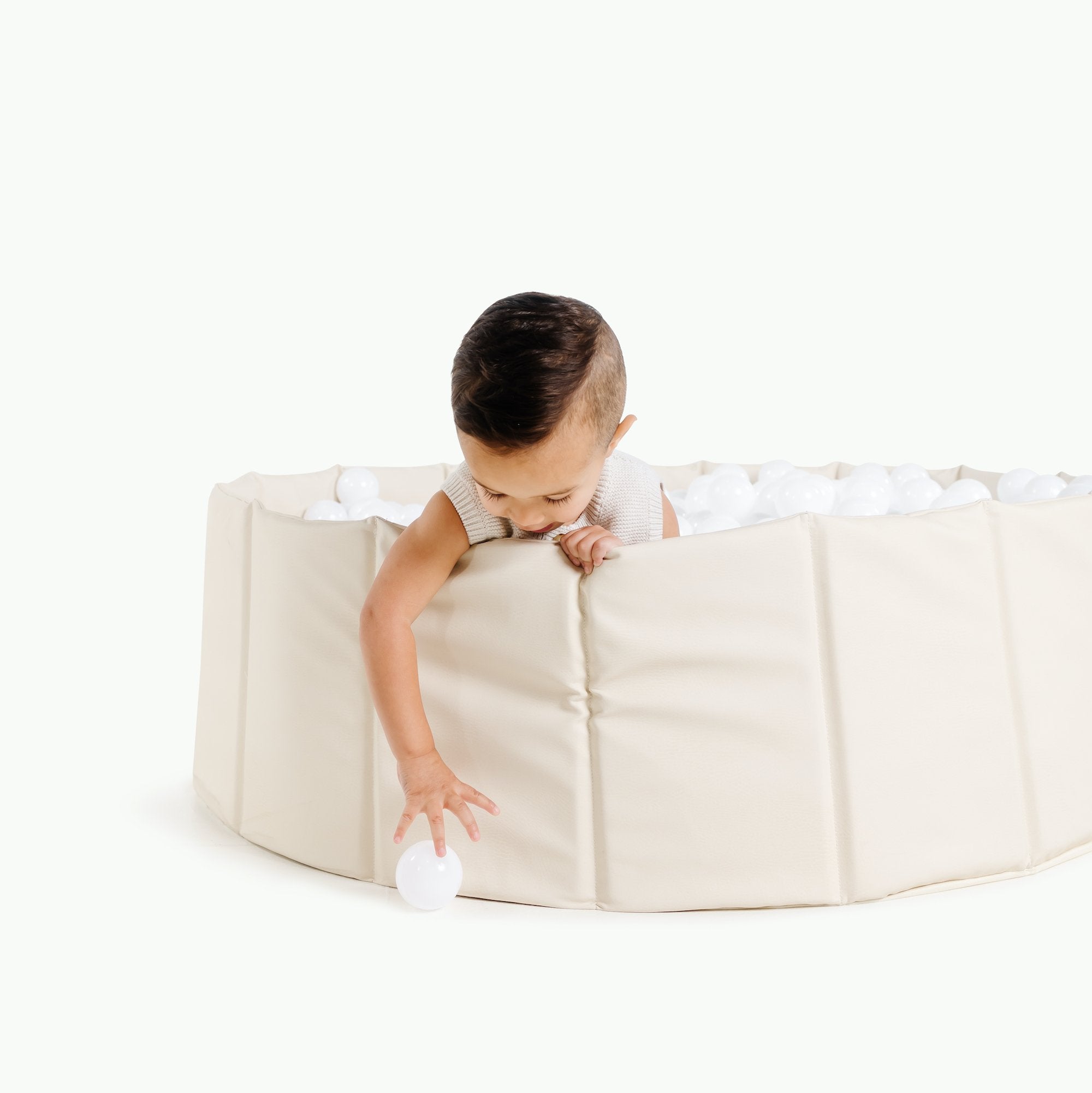Ivory@Kid playing in the Ivory Ball Pit