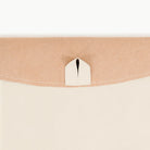 Ivory / Circle@Hanging tab detail on the Ivory Midi Circle Mat
