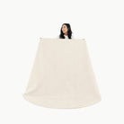 Ivory / Circle@Woman holding the Ivory Maxi Circle Mat