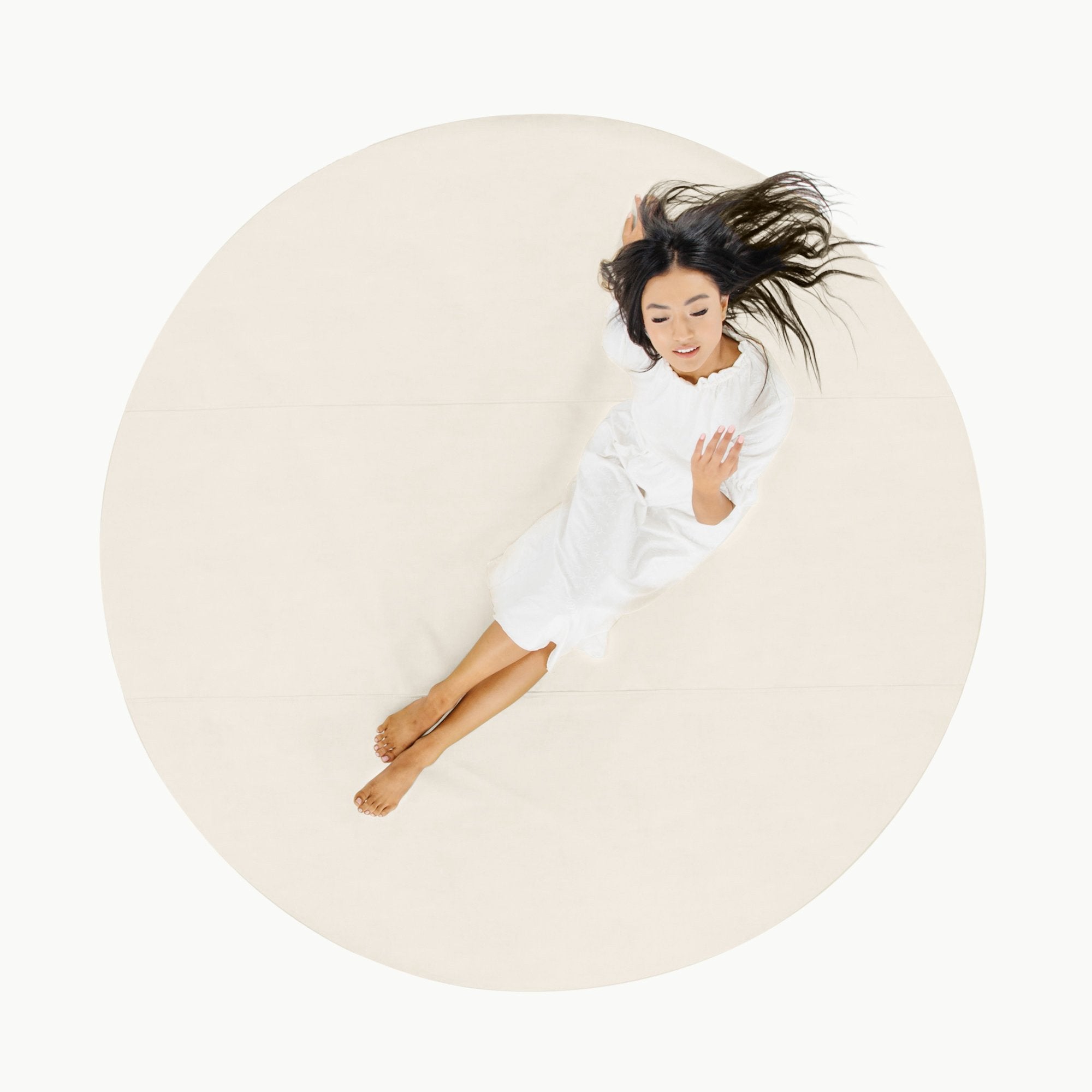 Ivory / Circle@Overhead woman sitting on the Ivory Maxi Circle Mat