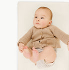 Ivory@Baby laying on Ivory Padded micro+
