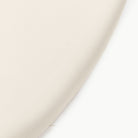 Ivory@close up of ivory padded midi circle