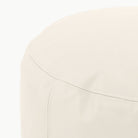 Ivory@Close up of seaming on Ivory Circle Pouf