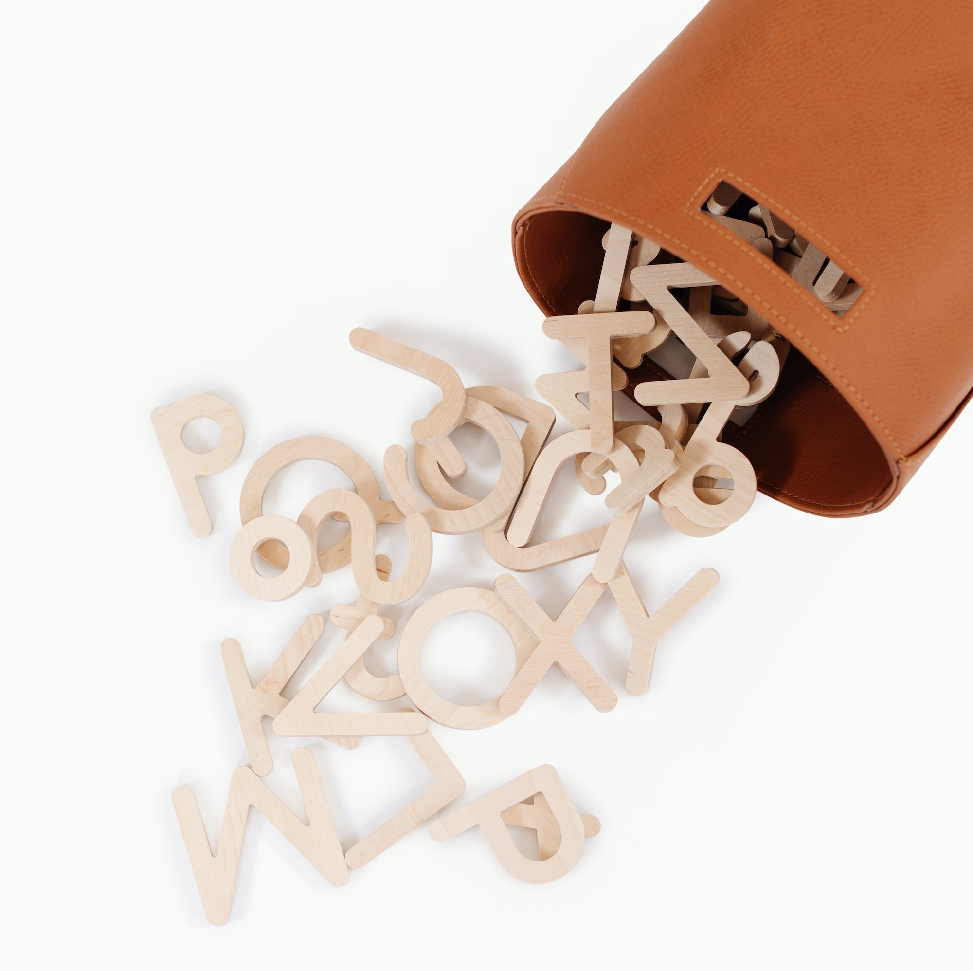 Birch (on sale)@Wooden Letters pouring out of a Small Storage Bin