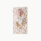 London (on sale)@overhead of baby on the london micro+ mat