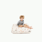 Menagerie (on sale) / Square@Kid sitting on the Menagerie Square Floor Cushion