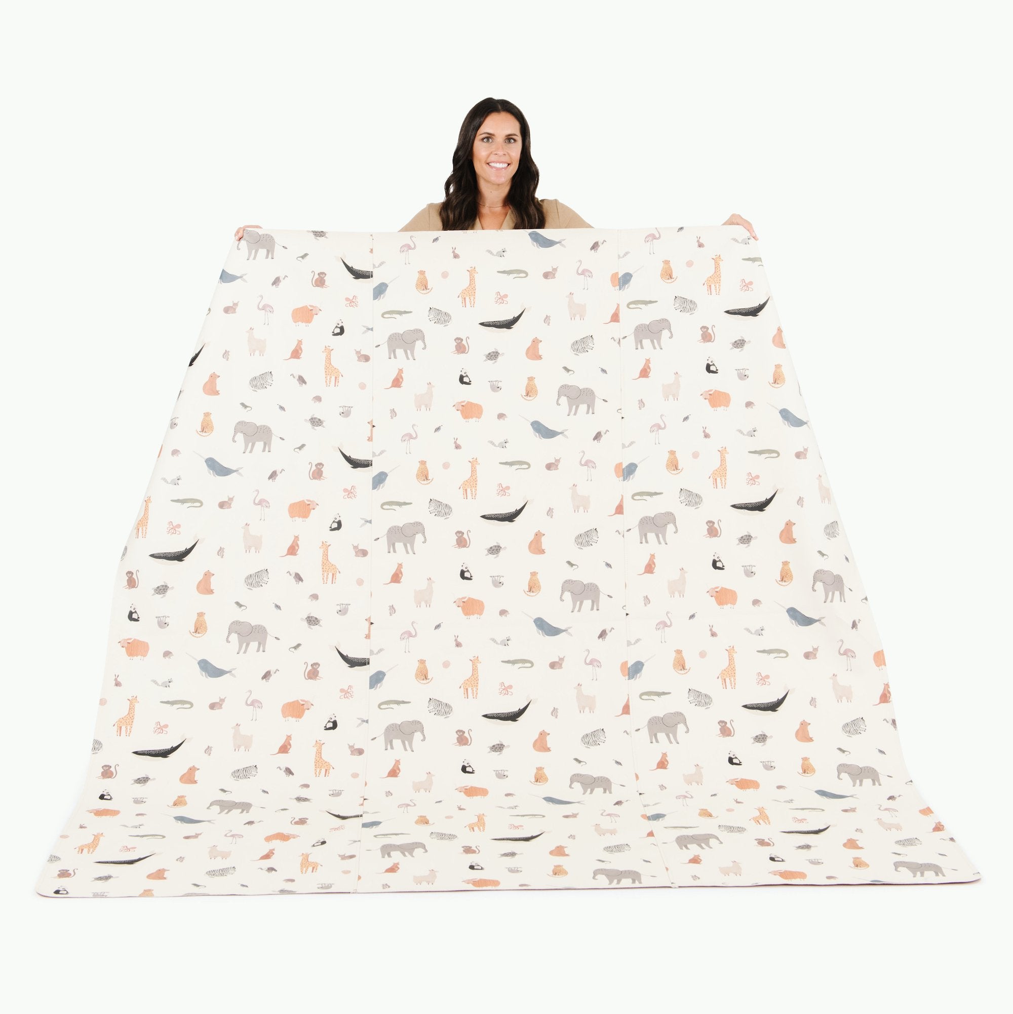 Menagerie / Square@Woman holding the Menagerie Maxi Square Mat