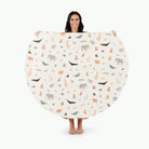 Menagerie (on sale) / Circle@Woman holding the Menagerie Midi Circle Mat