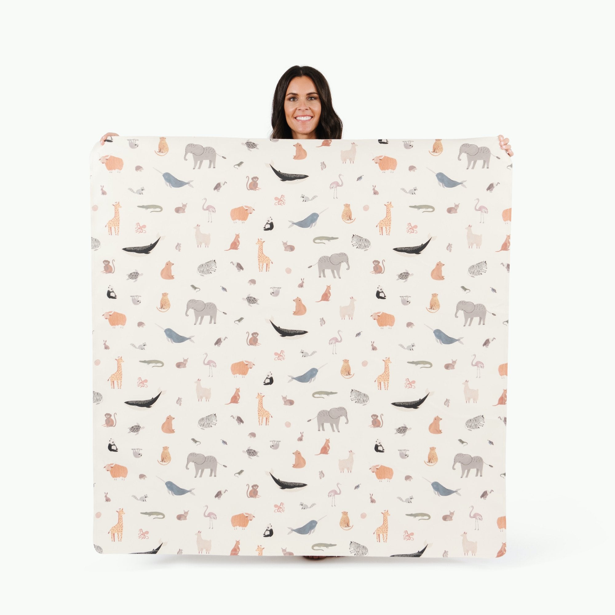 Menagerie (on sale) / Square@Woman holding the Menagerie Midi Square Mat