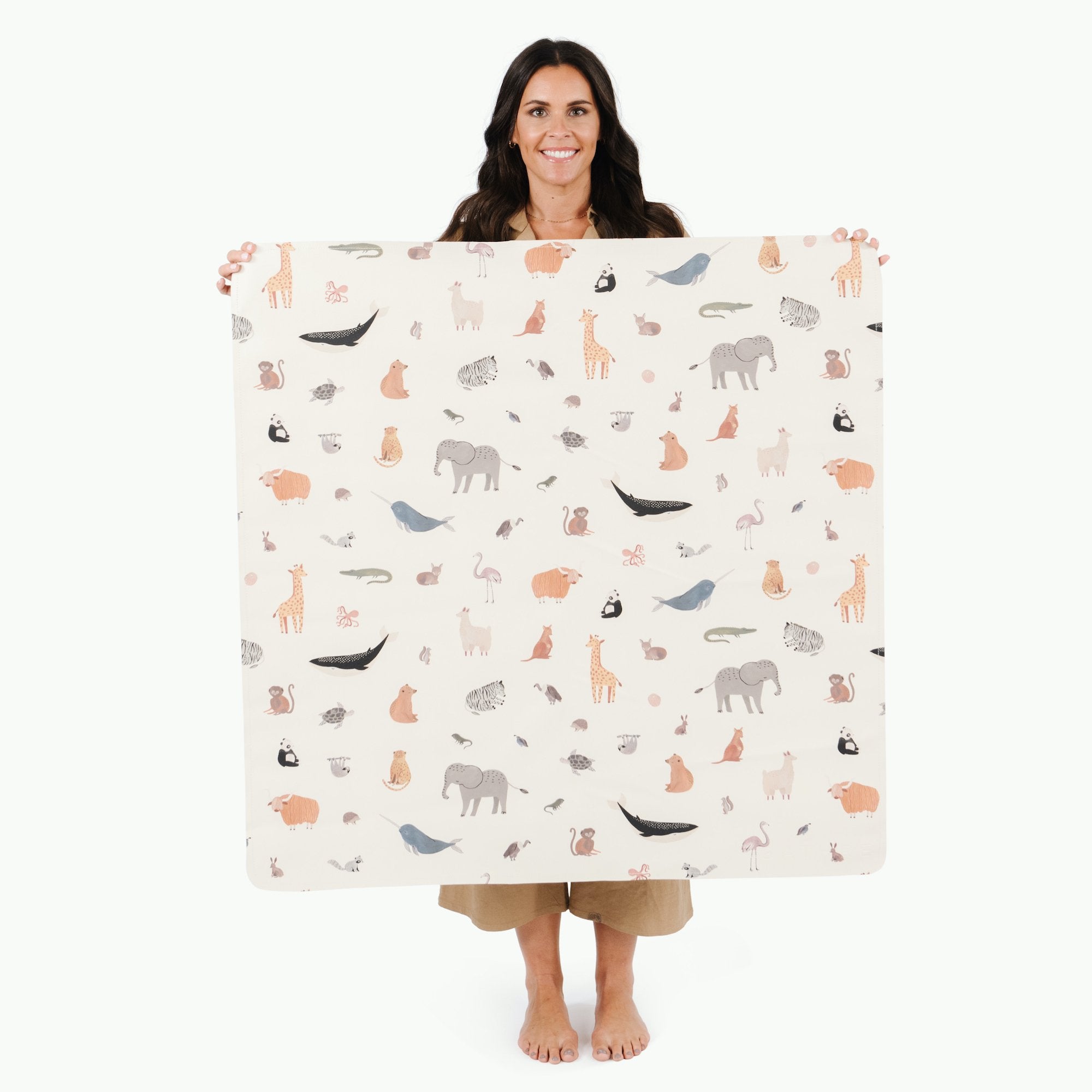 Menagerie@Woman holding the Menagerie Mini Mat
