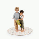 Menagerie (on sale)@kids standing on Menagerie Padded Midi Circle