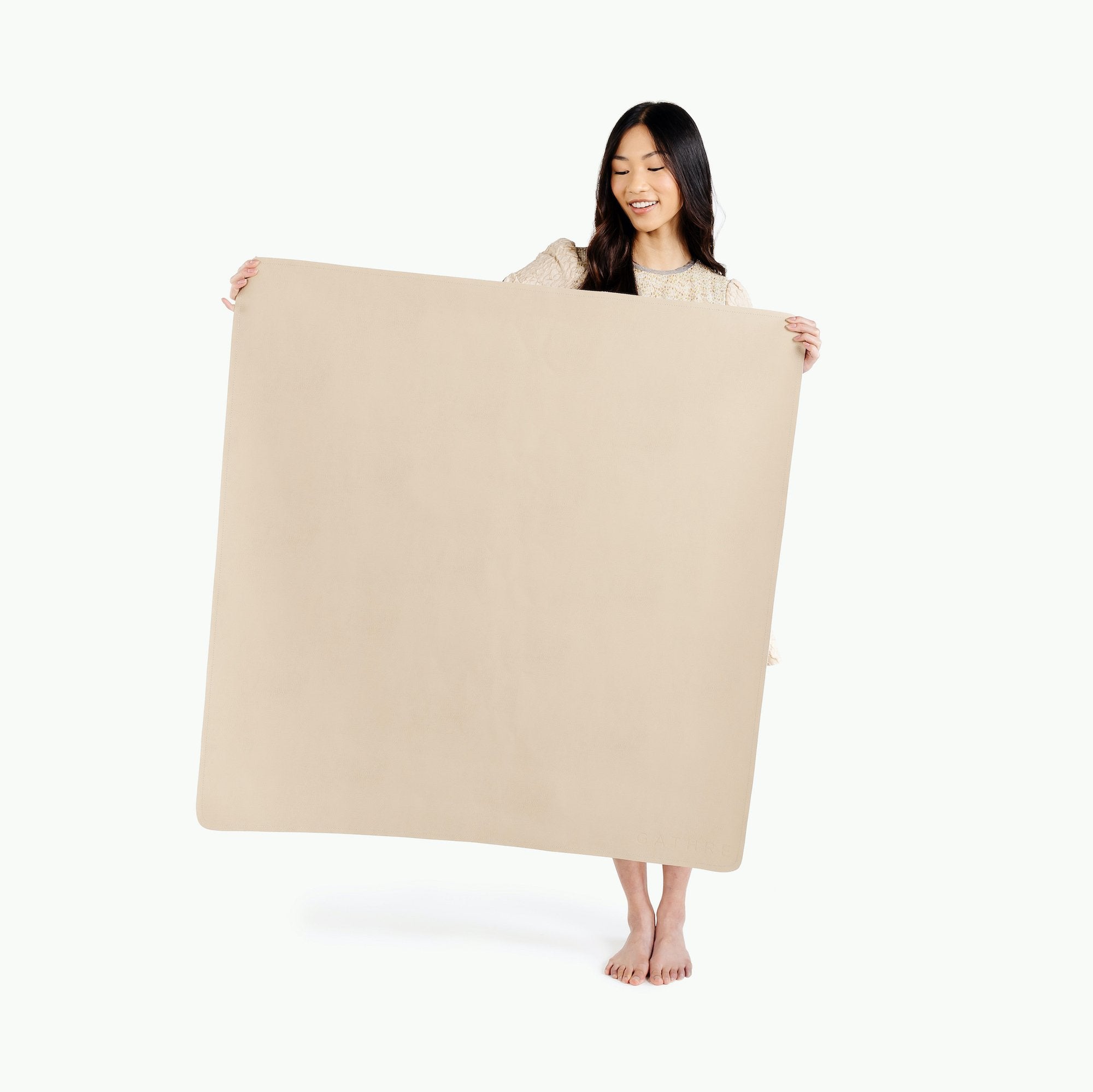 Millet / Highchair Mat@ Mini (Color) woman holding the mini millet mat