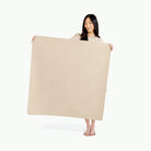 Millet / Highchair Mat@ Mini (Color) woman holding the mini millet mat