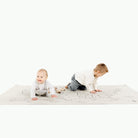 National Parks (on sale)@Kid sitting on the National Parks Midi+ Mat