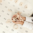 Birch (on sale)@Kids playing with Wooden Numbers on the Numbers Mini Mat 
