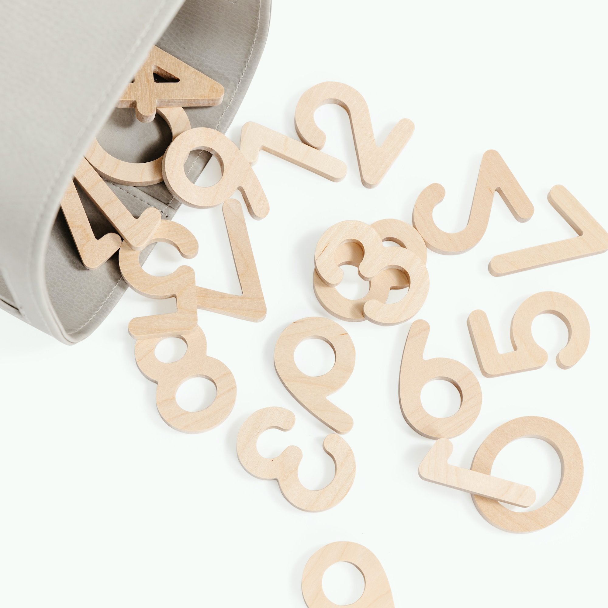 Birch (on sale)@Wooden Letters pouring out of a Small Storage Bin