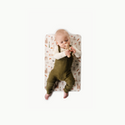 Paris (on sale)@overhead of baby on the paris micro mat