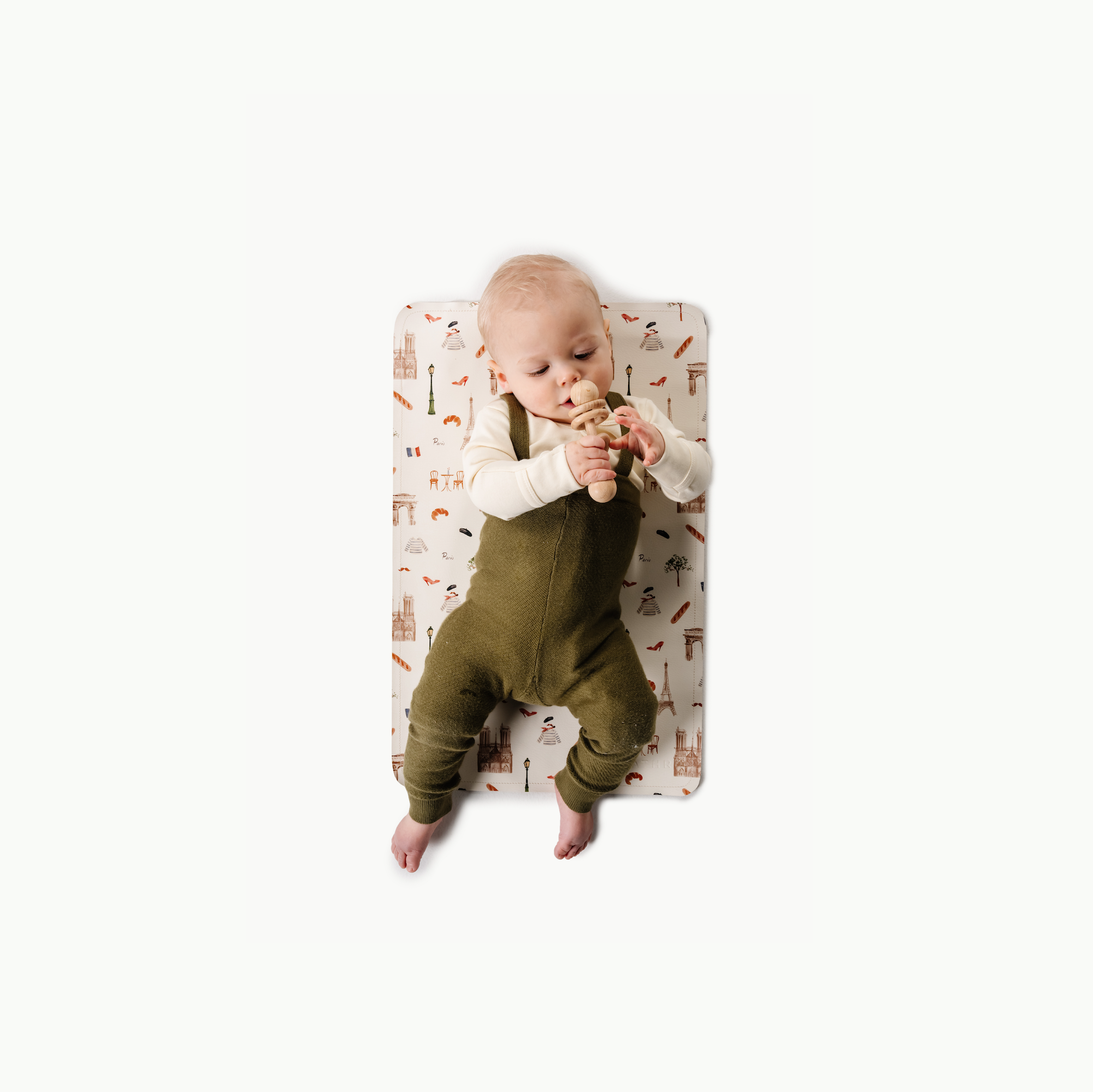 Paris (on sale)@overhead of baby on the paris micro mat