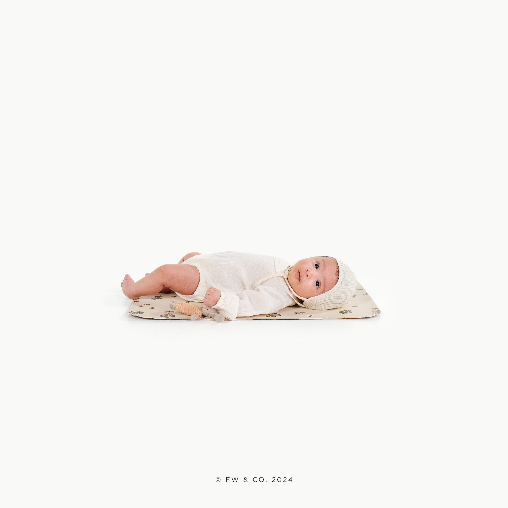 Peter Rabbit™@baby on a Peter Rabbit Micro Mat