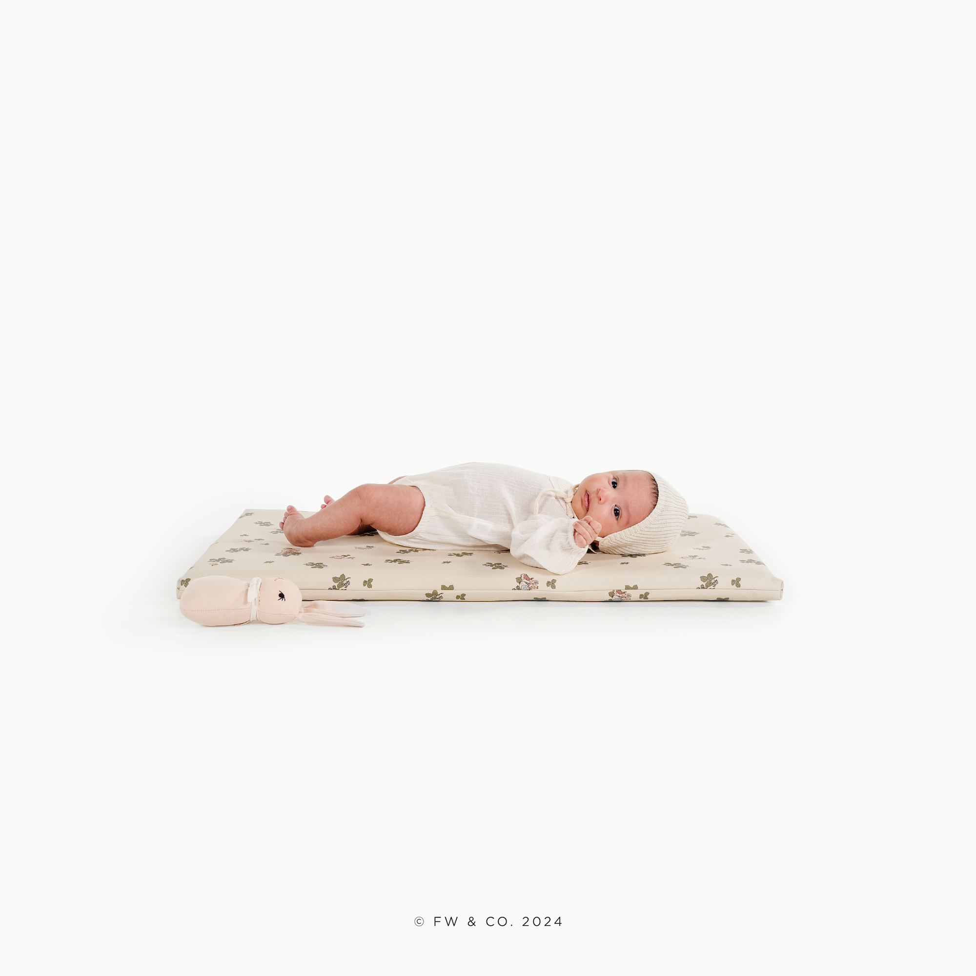 Peter Rabbit™ (on sale)@baby on padded micro+ mat