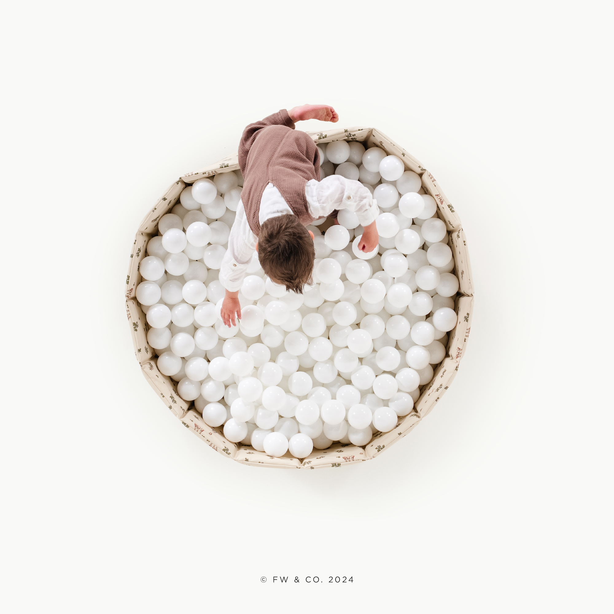 Peter Rabbit™ (on sale)@Child playing in a soft ball pit designed for babies and toddlers