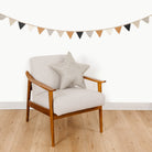Stone Stripe@Stone Stripe hanging on the wall above a chair