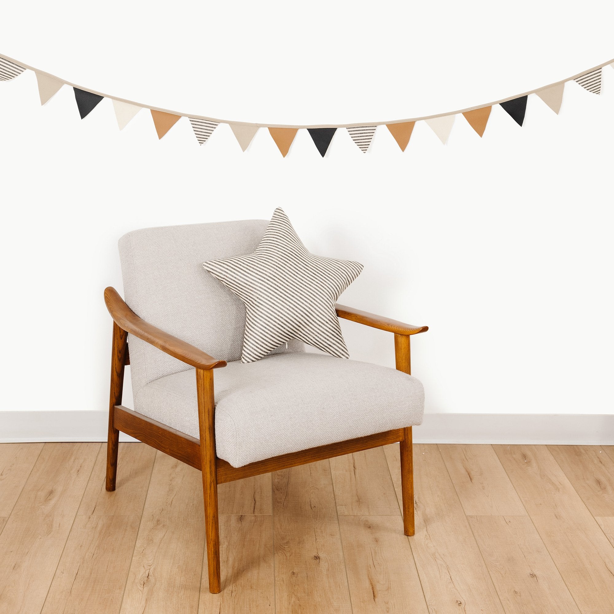 Stone Stripe@Stone Stripe hanging on the wall above a chair