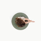 Thyme@Overhead of kid sitting on a Thyme Circle Pouf